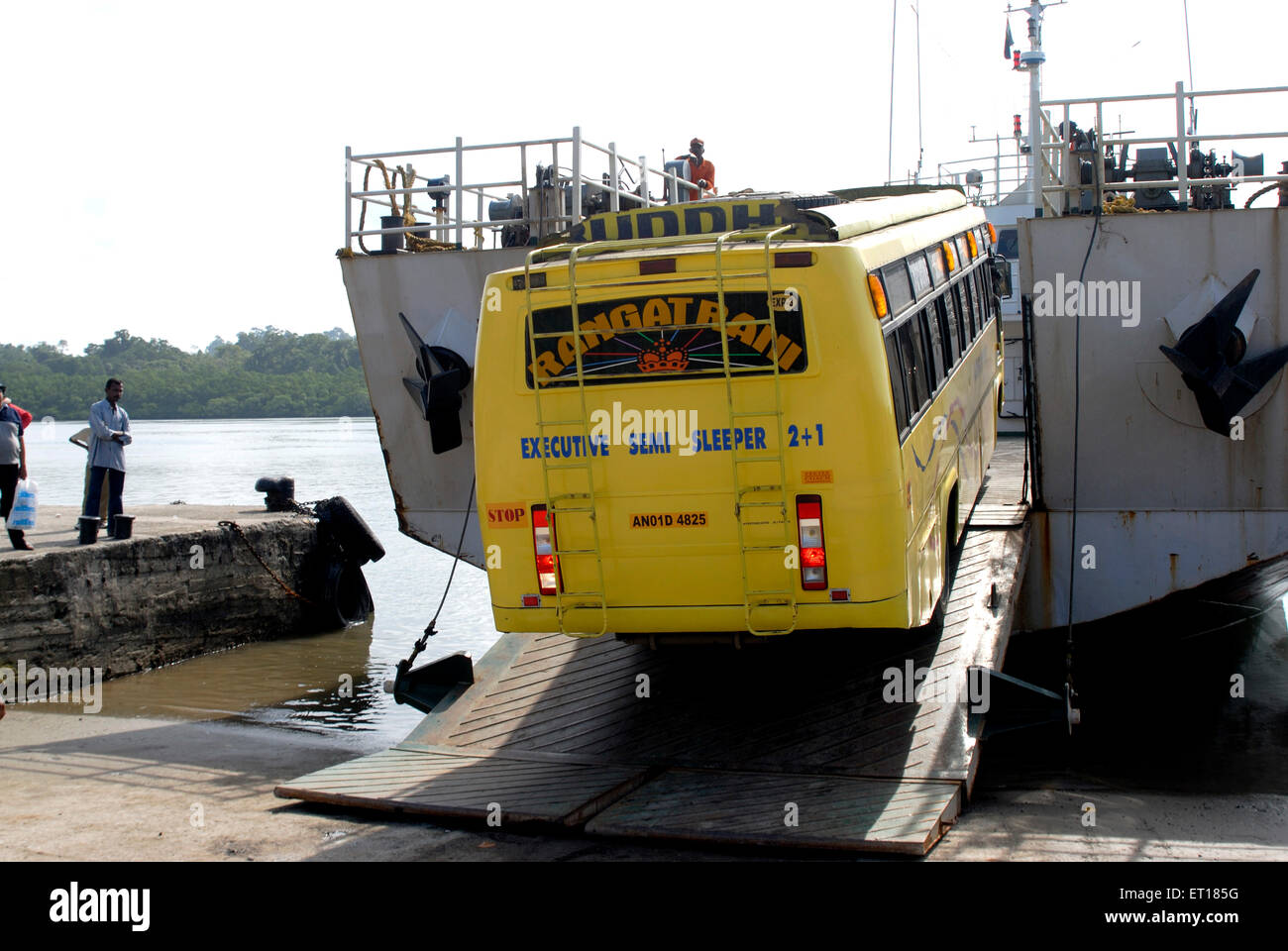 Loading of bus on barge ferryboat Port Blair Andaman and Nicobar Islands Bay of Bengal India - rmm 162137 Stock Photo