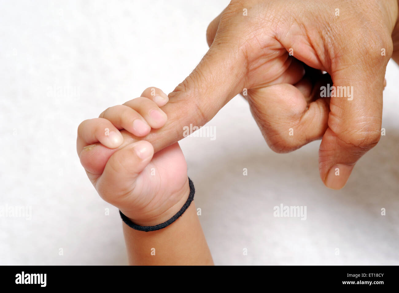 Download Indian Mother Baby Hand High Resolution Stock Photography And Images Alamy