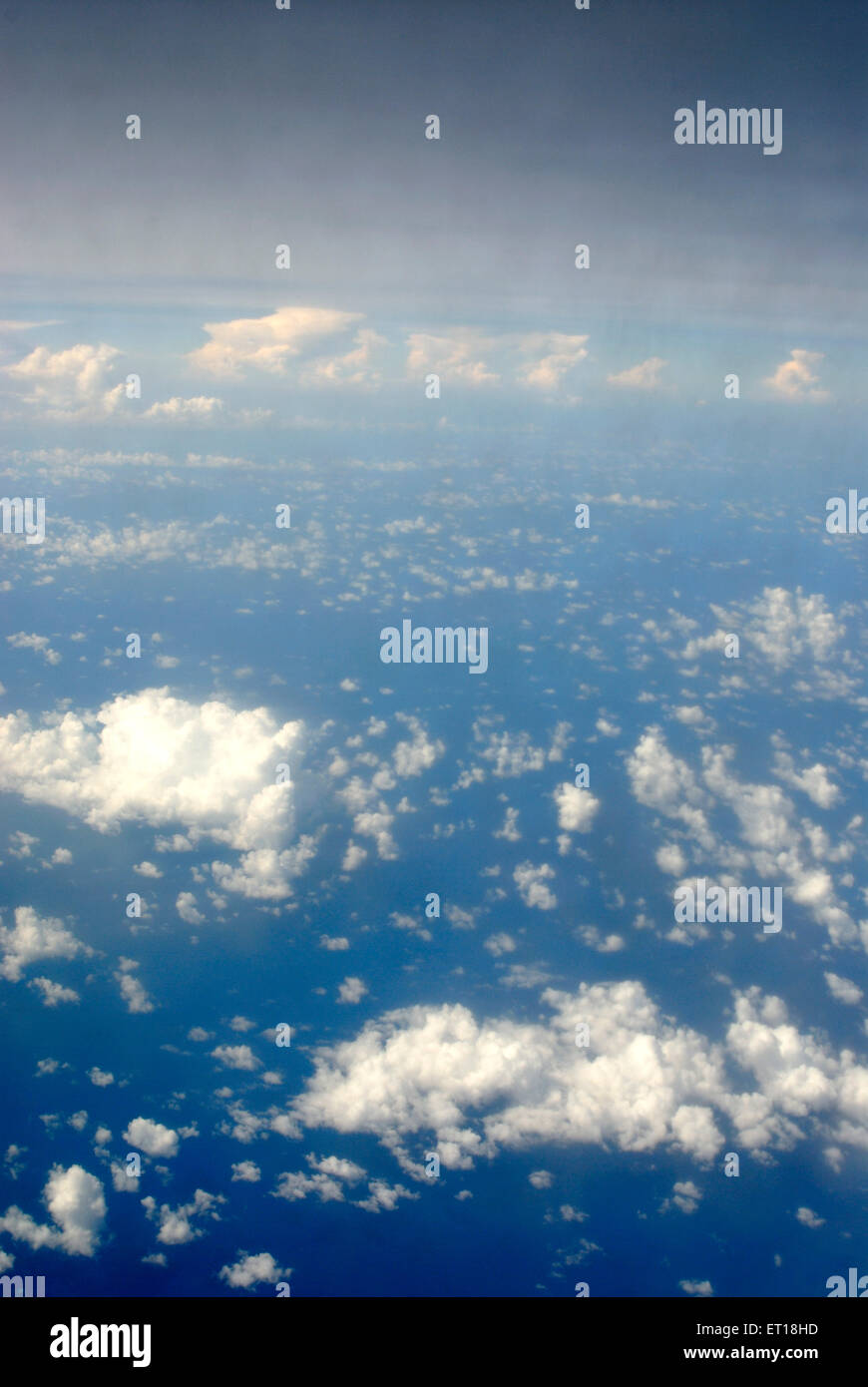 blue sky white clouds aerial from top aircraft Stock Photo