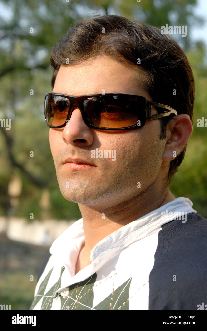 Boy in sunglasses glares MR#364 Stock Photo - Alamy