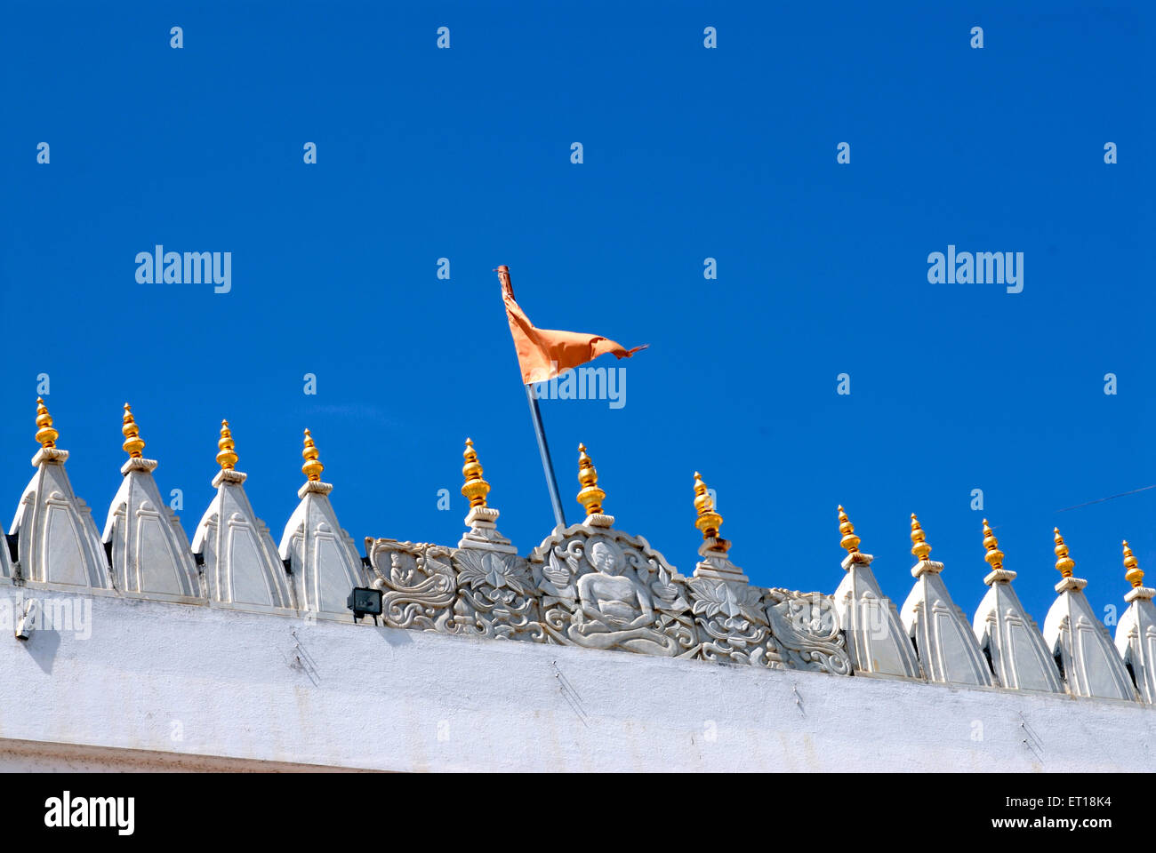 Flag on bhagwan shri mahavir swami digamber mandir jain derasa temple ; Devlali ; Maharashtra ; India November 2008 Stock Photo