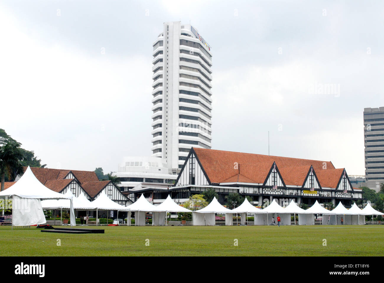 White tents in front of club building ; Malaysia Stock Photo