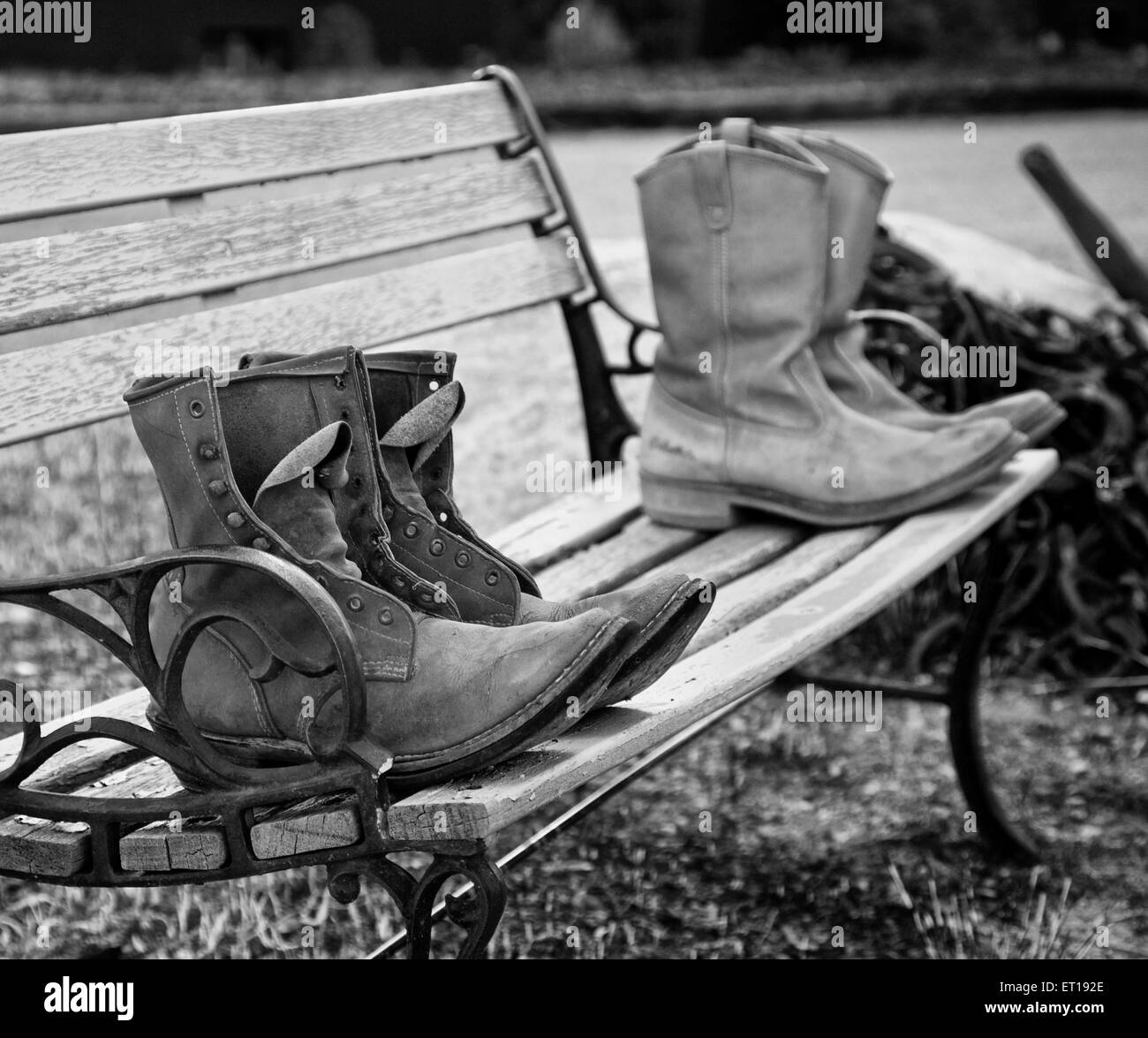 Work boots dry on a bench out West. Stock Photo