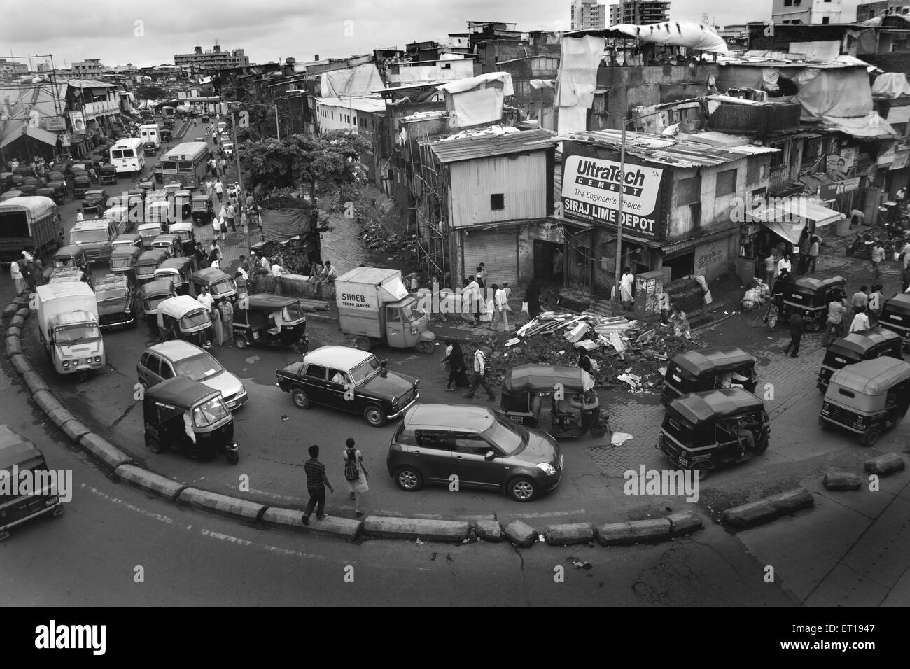 Traffic and slum of beharampada ; Bandra ; Bombay Mumbai ; Maharashtra ; India Stock Photo
