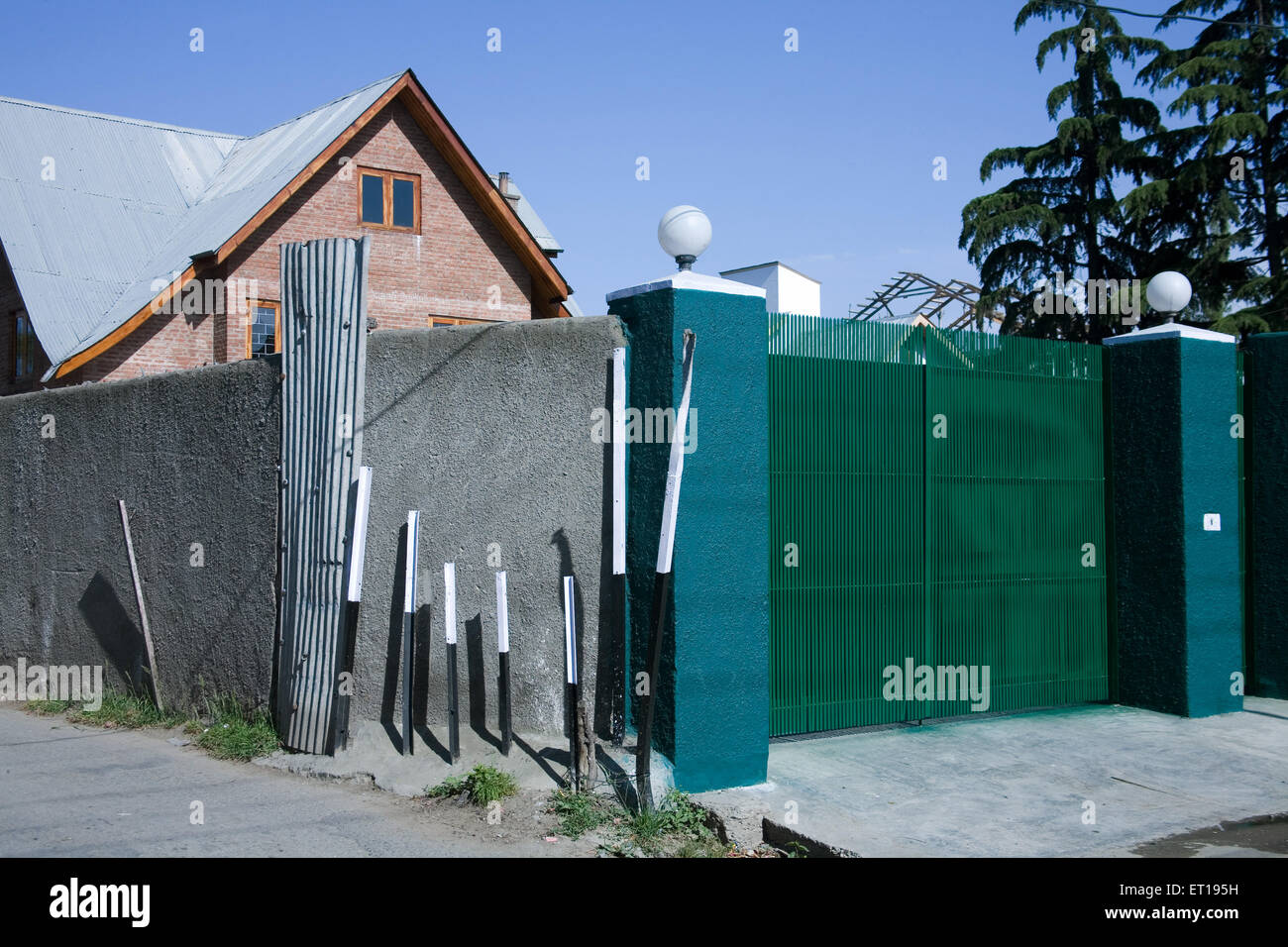 Green gate of bungalow ; Srinagar ; Jammu and Kashmir ; India Stock Photo