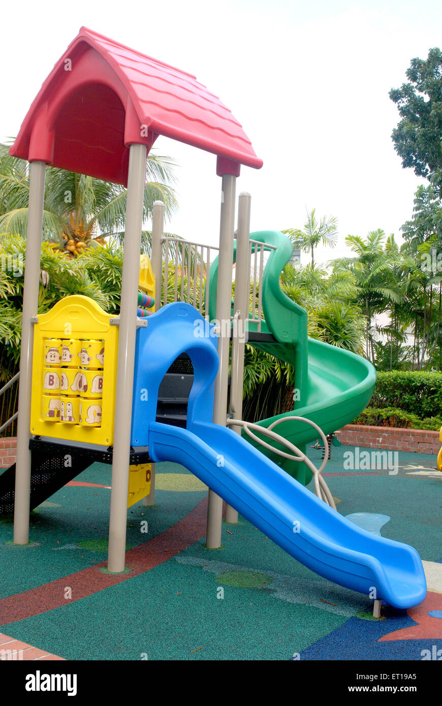 Children playground, plastic slide, kids play equipment, Stock Photo