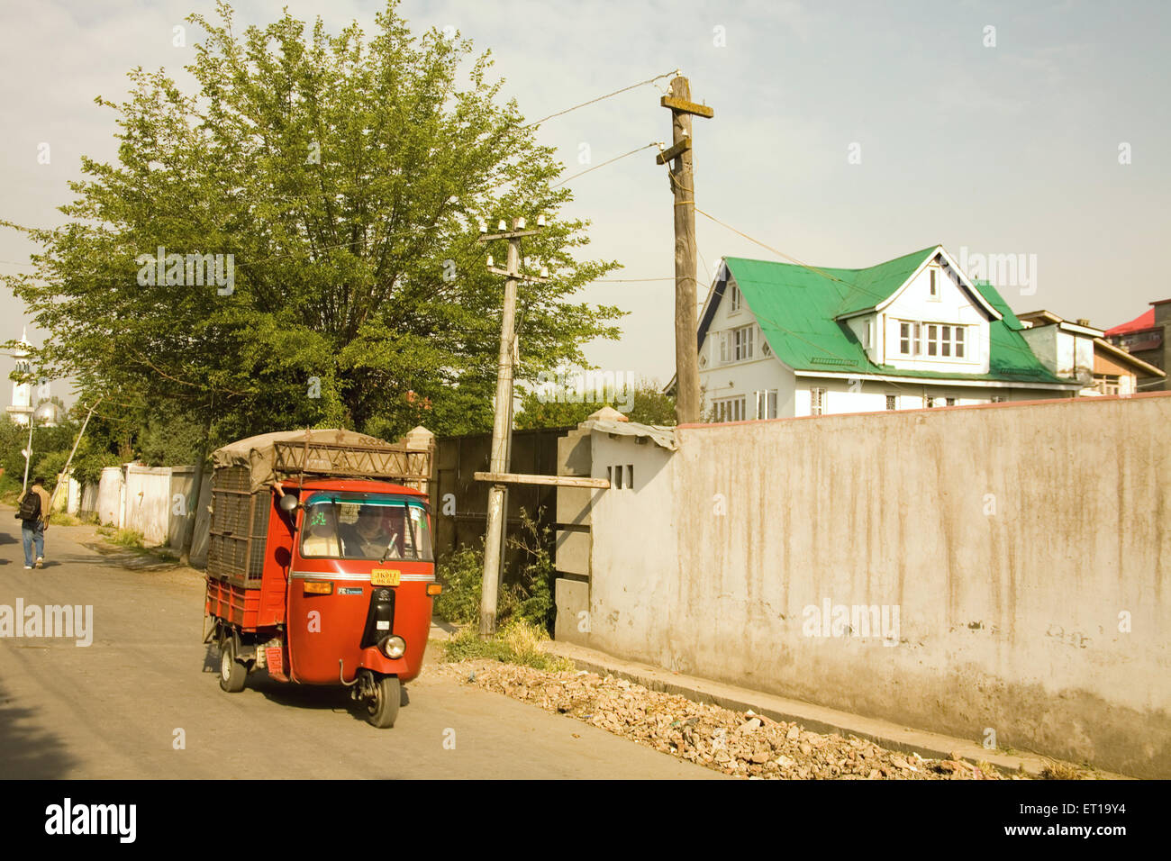 Red rickshaw ; Srinagar ; Jammu and Kashmir ; India Stock Photo