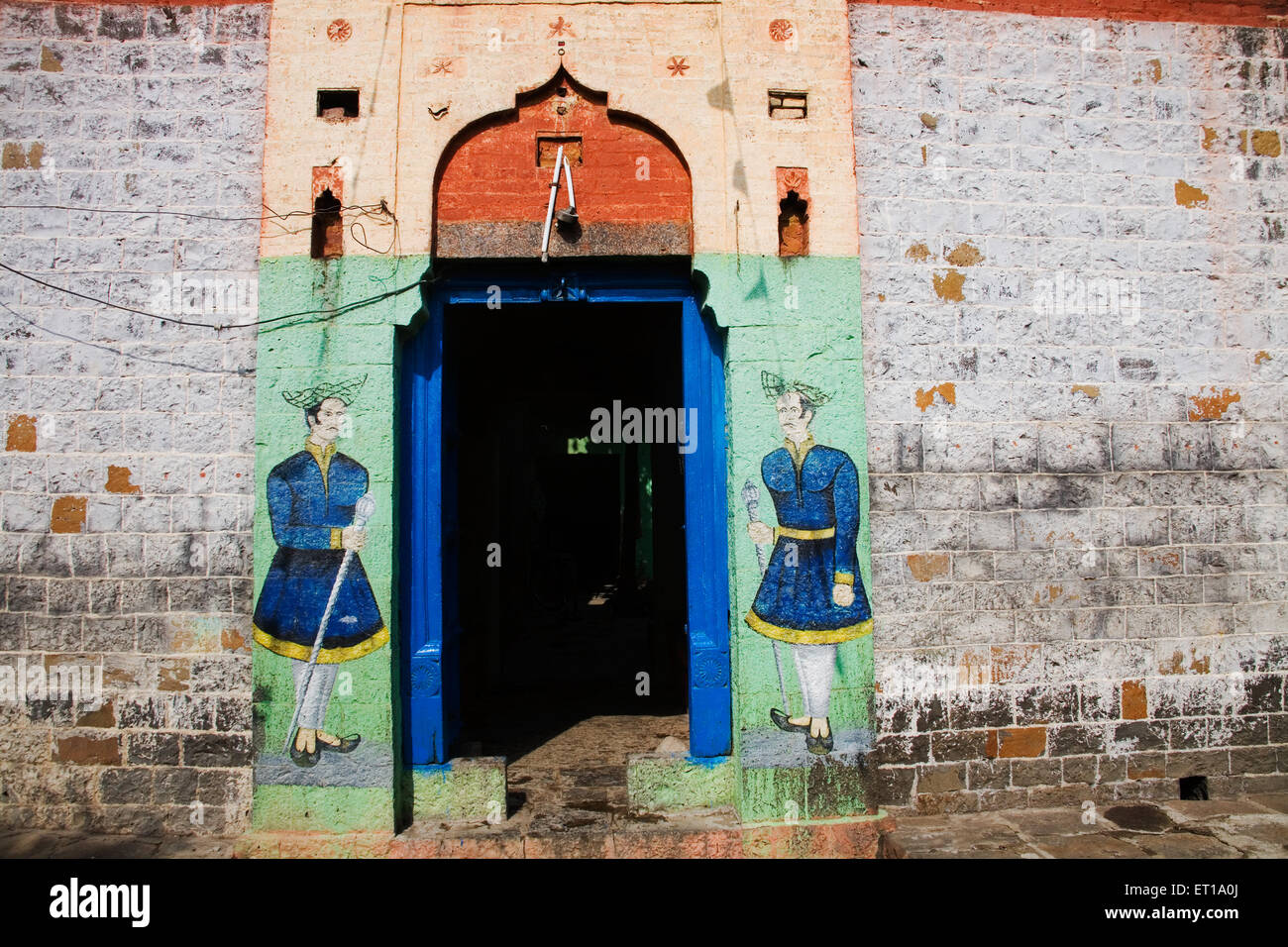 Guards painted on wall of house ; Nandur ; Marathwada ; Maharashtra ; India Stock Photo