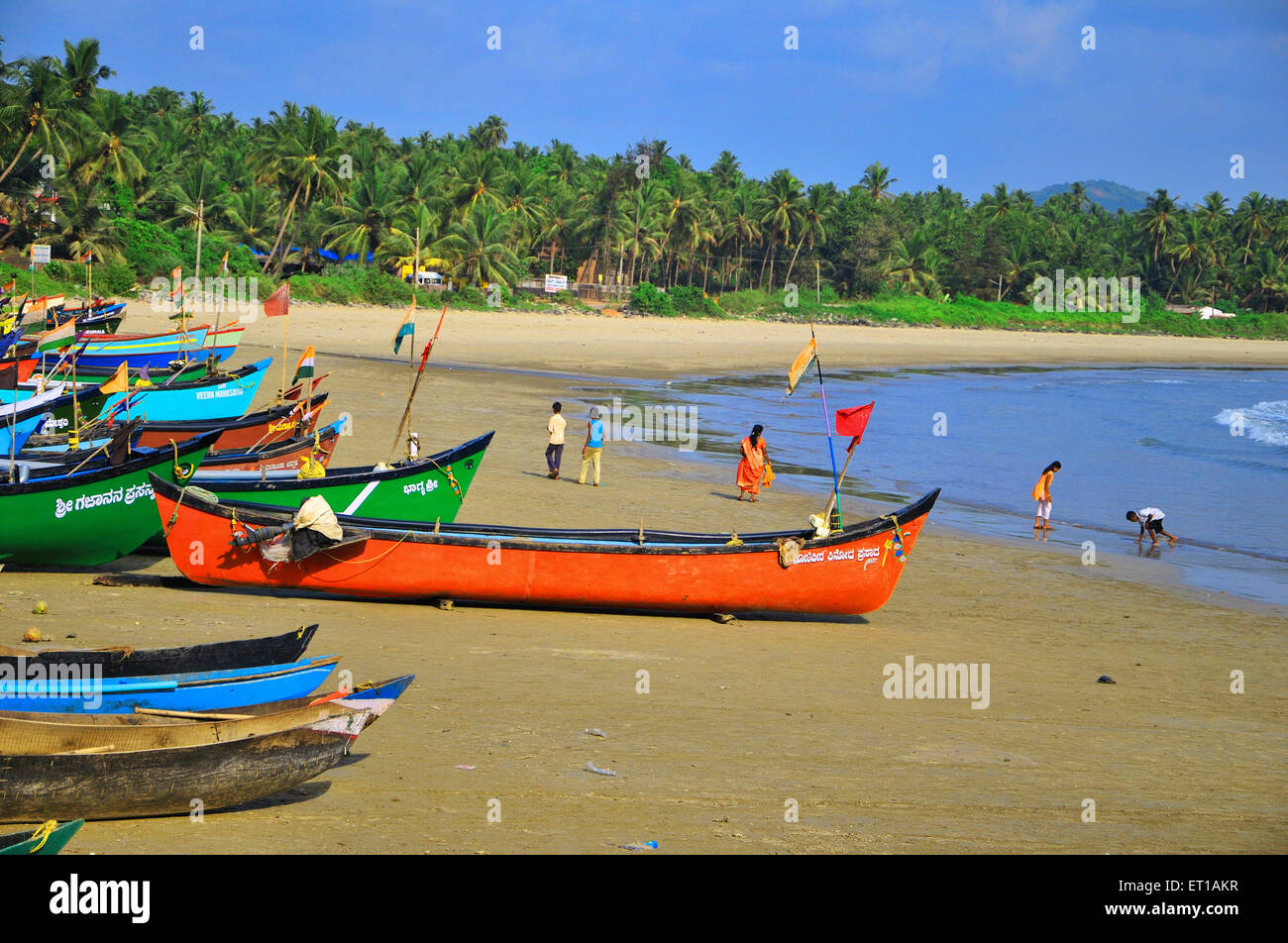 Seashore with boats anchored at Murdeshwar beach ; Karnataka ; India 4 May 2009 Stock Photo