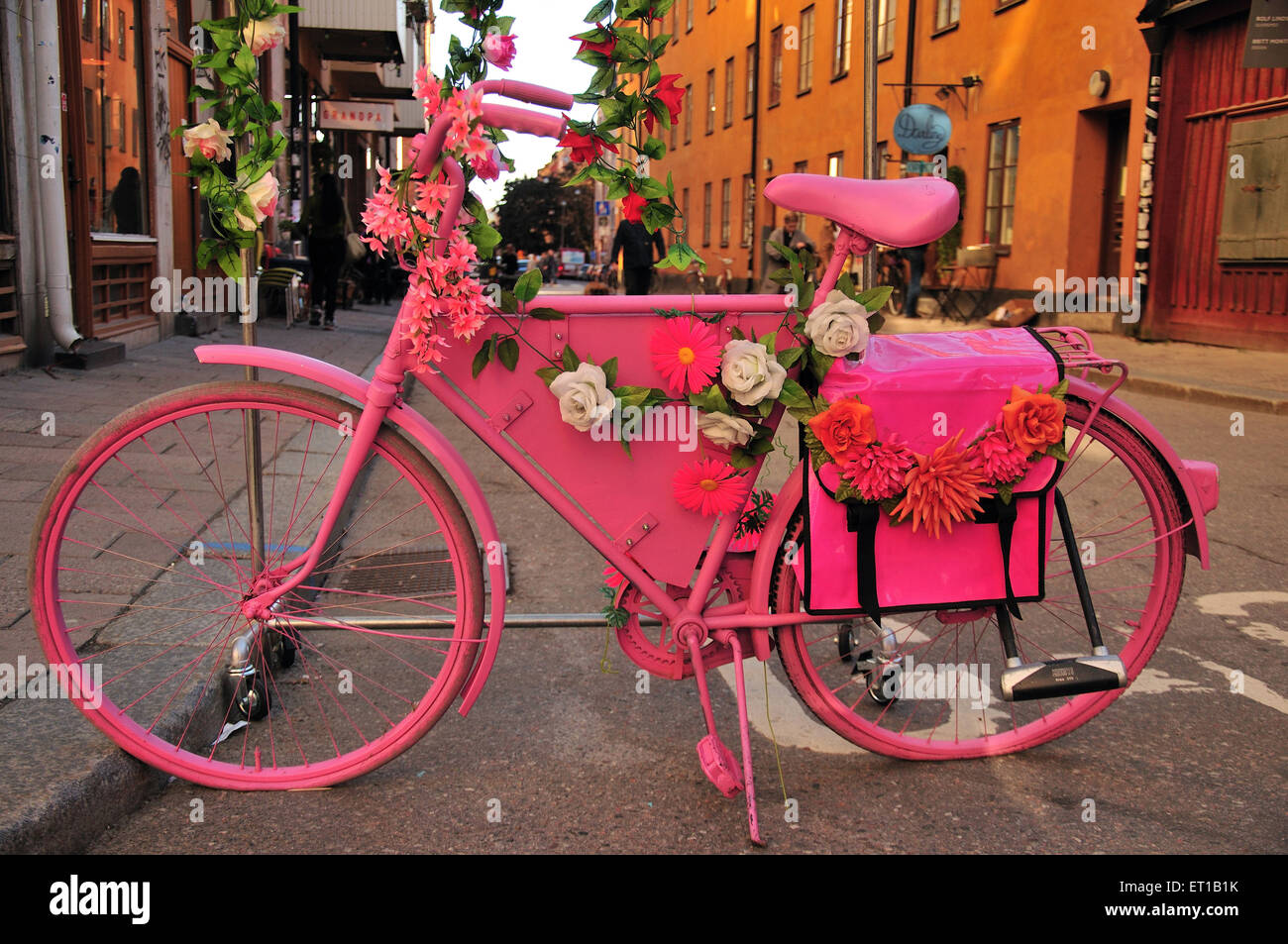 pink bicycle decorated flower Stockholm Sweden Stock Photo
