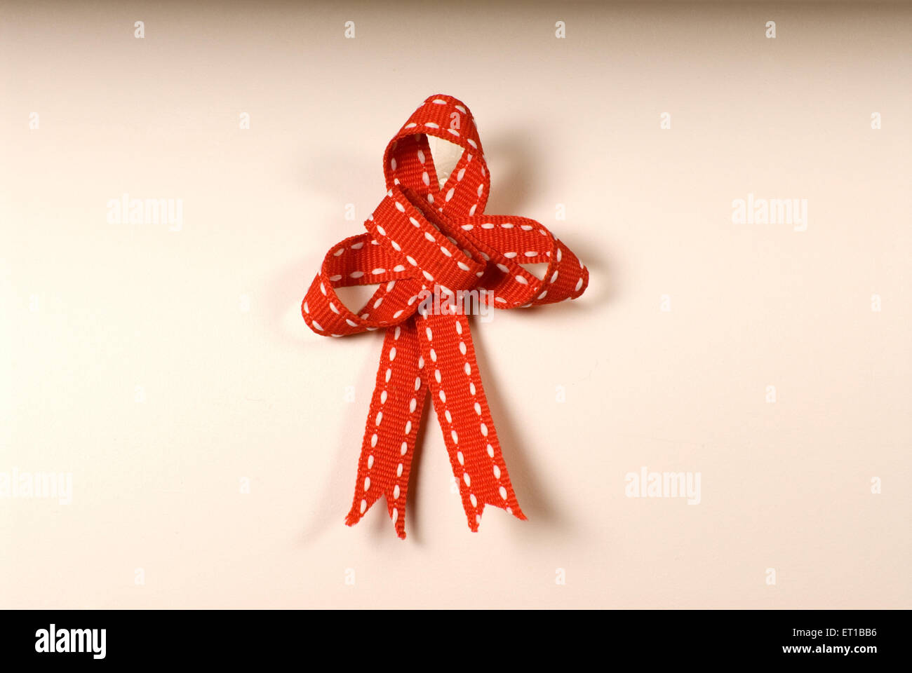 red white ribbon bow knot on white background Stock Photo