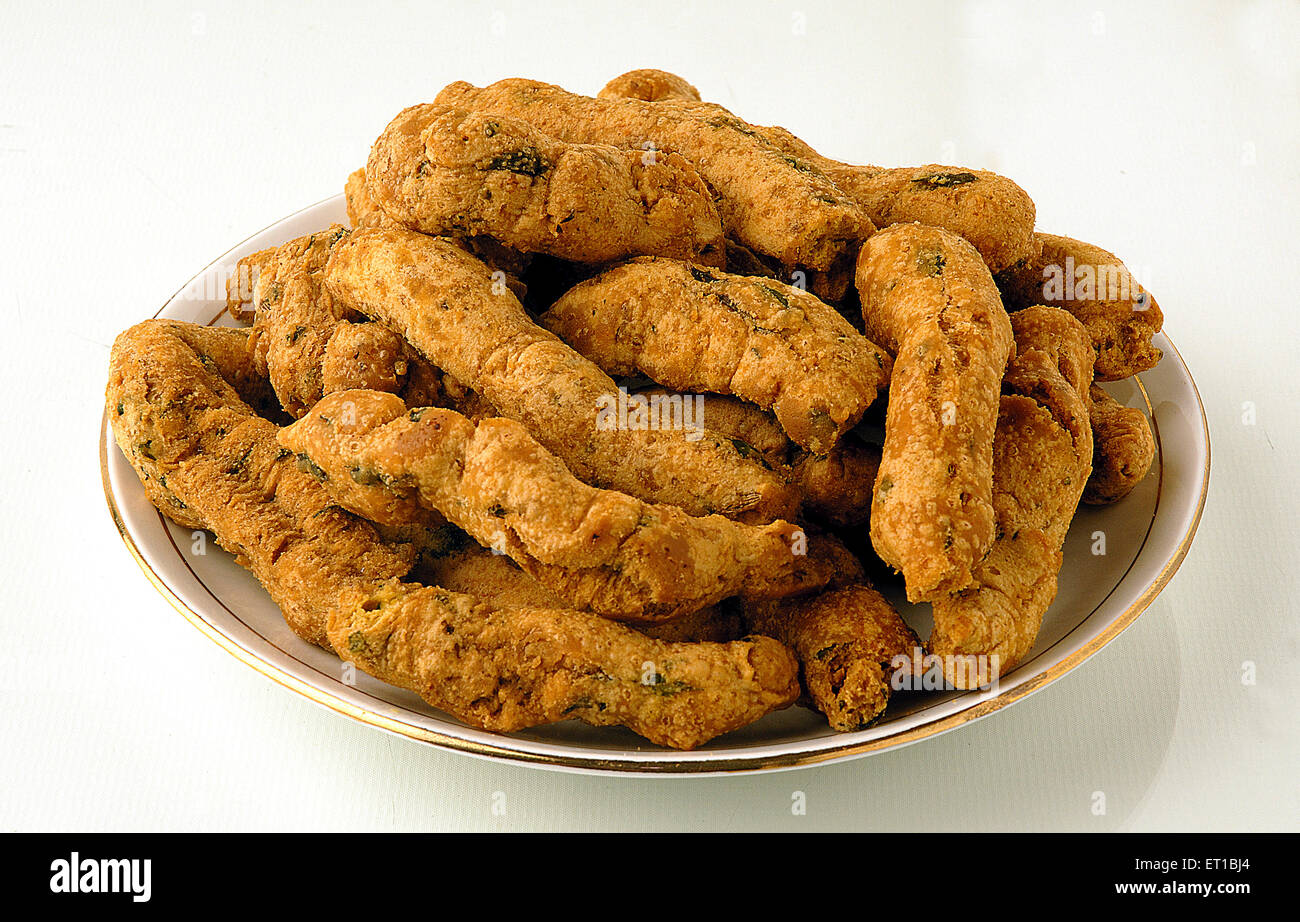 Indian Rajasthani fried snack salty mint crispies on white background Jodhpur Rajasthan India Stock Photo