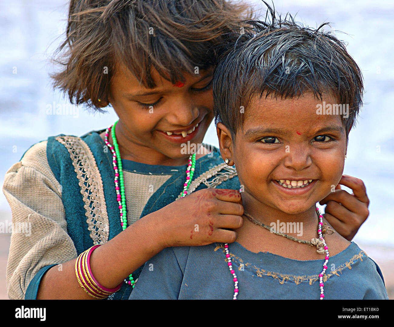 Little girls enjoying laughing ; Jodhpur ; Rajasthan ; India ;  MR#746B Stock Photo