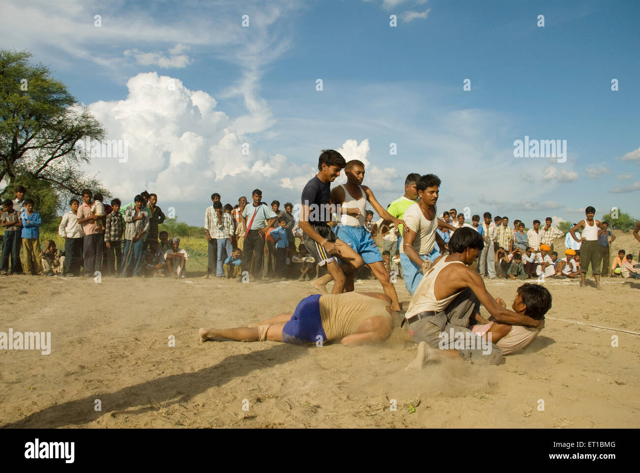 Men playing kabbadi in village ; Rajasthan ; India NOMR Stock Photo