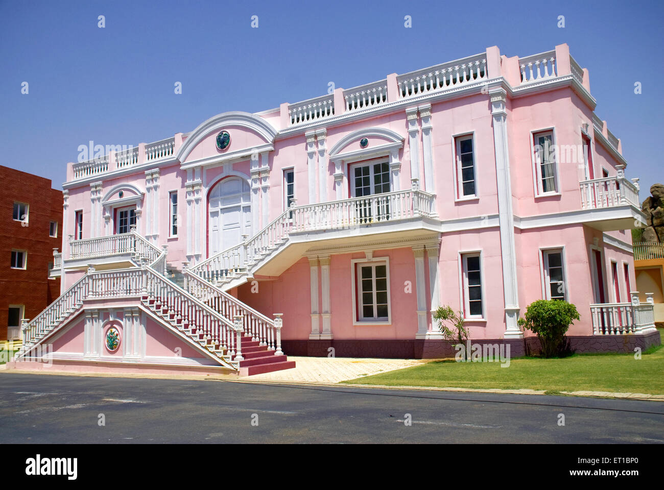Pink bungalow set at ramoji film city ; Hyderabad ; Andhra Pradesh ; India Stock Photo
