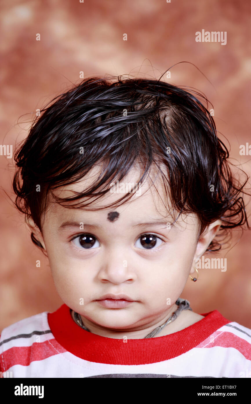Small boy looking at camera ; India MR#749 Stock Photo