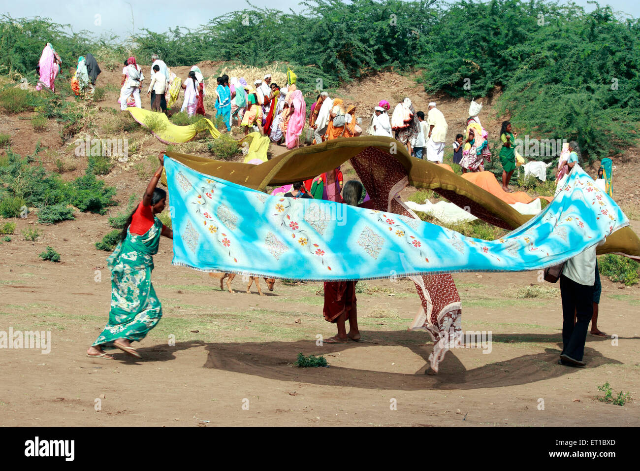 Varkari gathered at Chandrabhaga river on occasion of Ashadhi Ekadashi at Pandharpur town ; district Solapur ; state Maharashtra Stock Photo