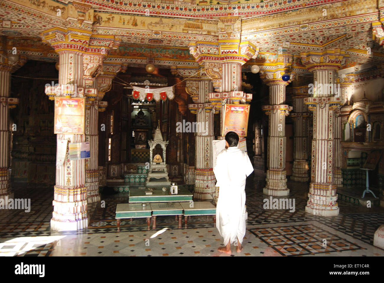 Devotee in Bhanda Shah Jain temple ; Bikaner ; Rajasthan ; India Stock Photo
