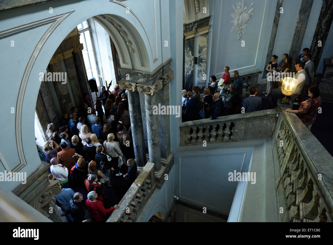 St. Petersburg, Russia, 10th June, 2015. Visitors wait for opening of the presentation of the exhibition of Antonio Meneghetti in the Marble Palace. The exposition includes more than 40 paintings created between 1995 and 2011 as well as unique artworks from Murano glass Credit:  Lilyana Vynogradova/Alamy Live News Stock Photo