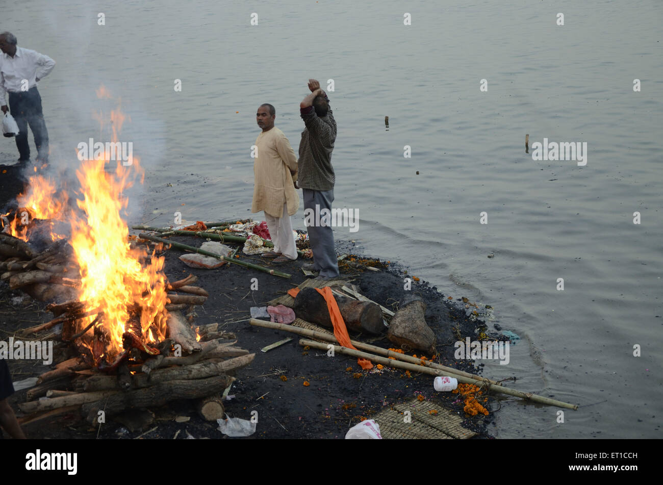 decease burning on Manikarnika Ghat in Varanasi at Uttar Pradesh India Stock Photo