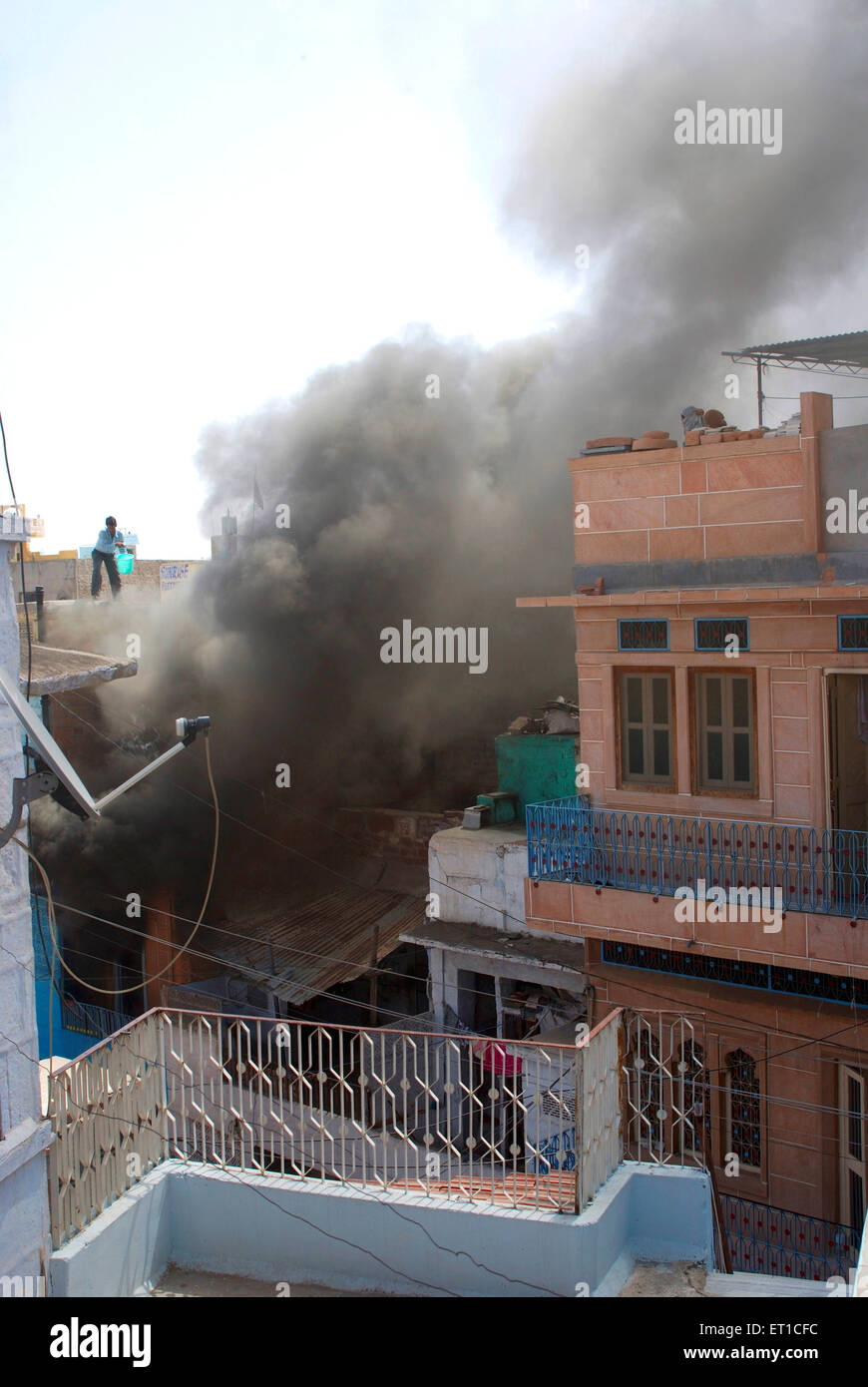 Smoke from fire ; Jodhpur ; Rajasthan ; India ; Asia ; Asian ; Indian Stock Photo