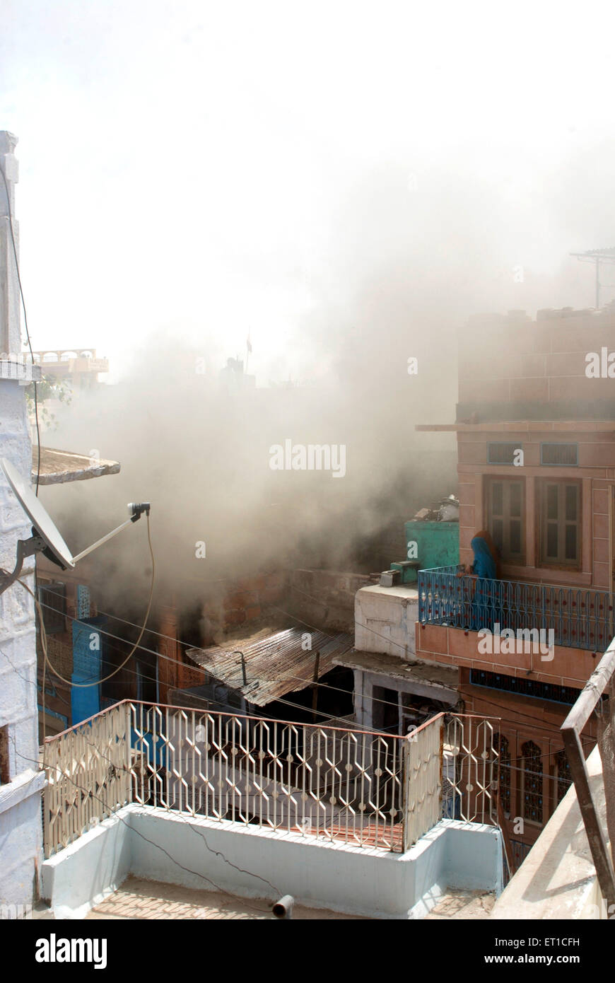 Smoke from fire ; Jodhpur ; Rajasthan ; India ; Asia ; Asian ; Indian Stock Photo