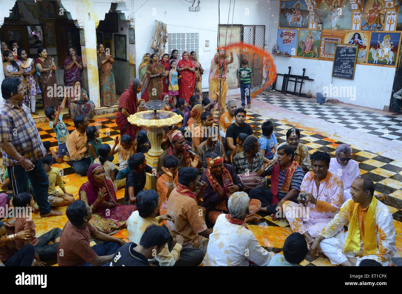 Men and women singing devotional songs in Gang shyamji temple at Jodhpur India Stock Photo