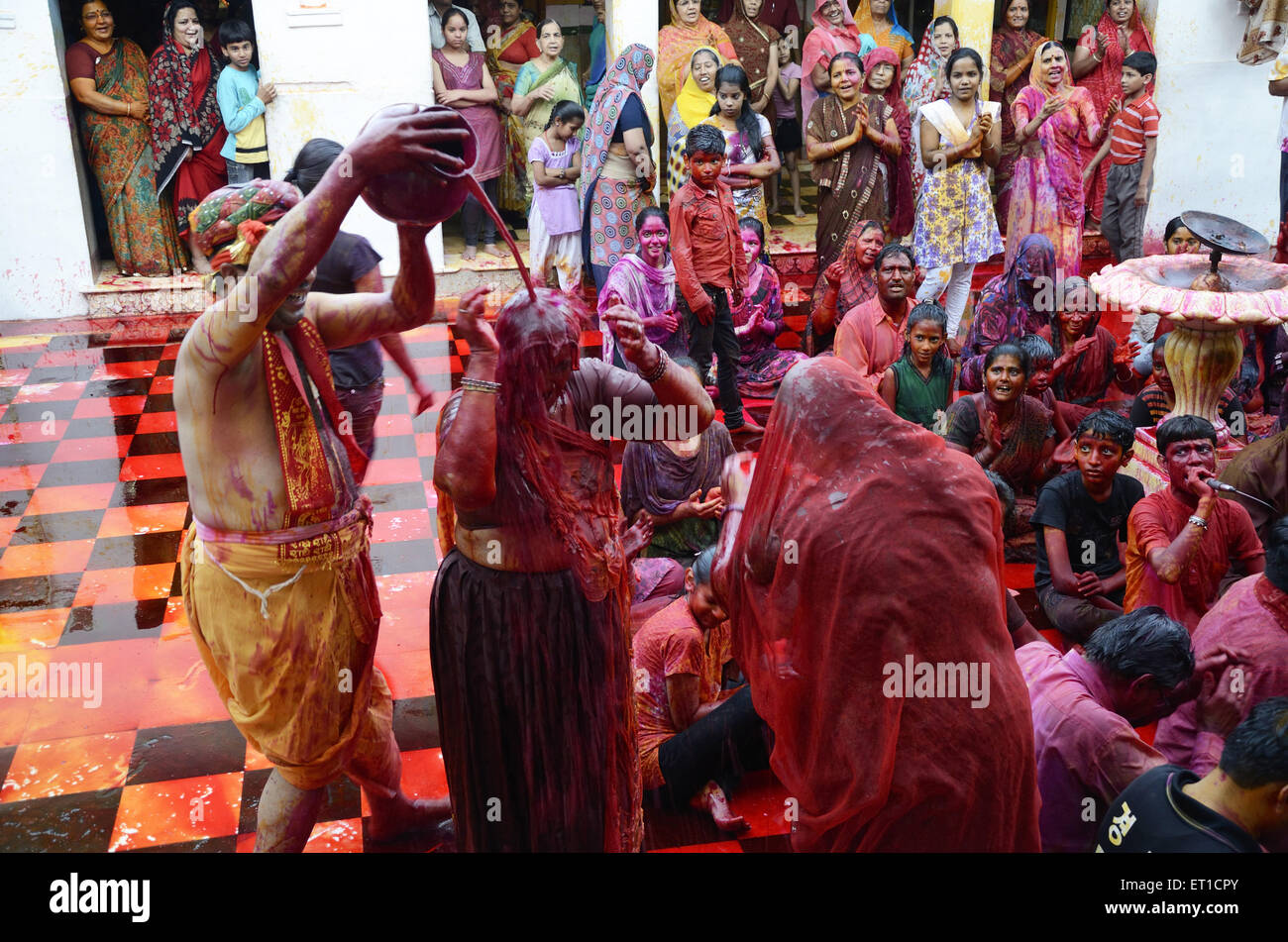 Men and women singing devotional songs in Gang shyamji temple at Jodhpur India Stock Photo