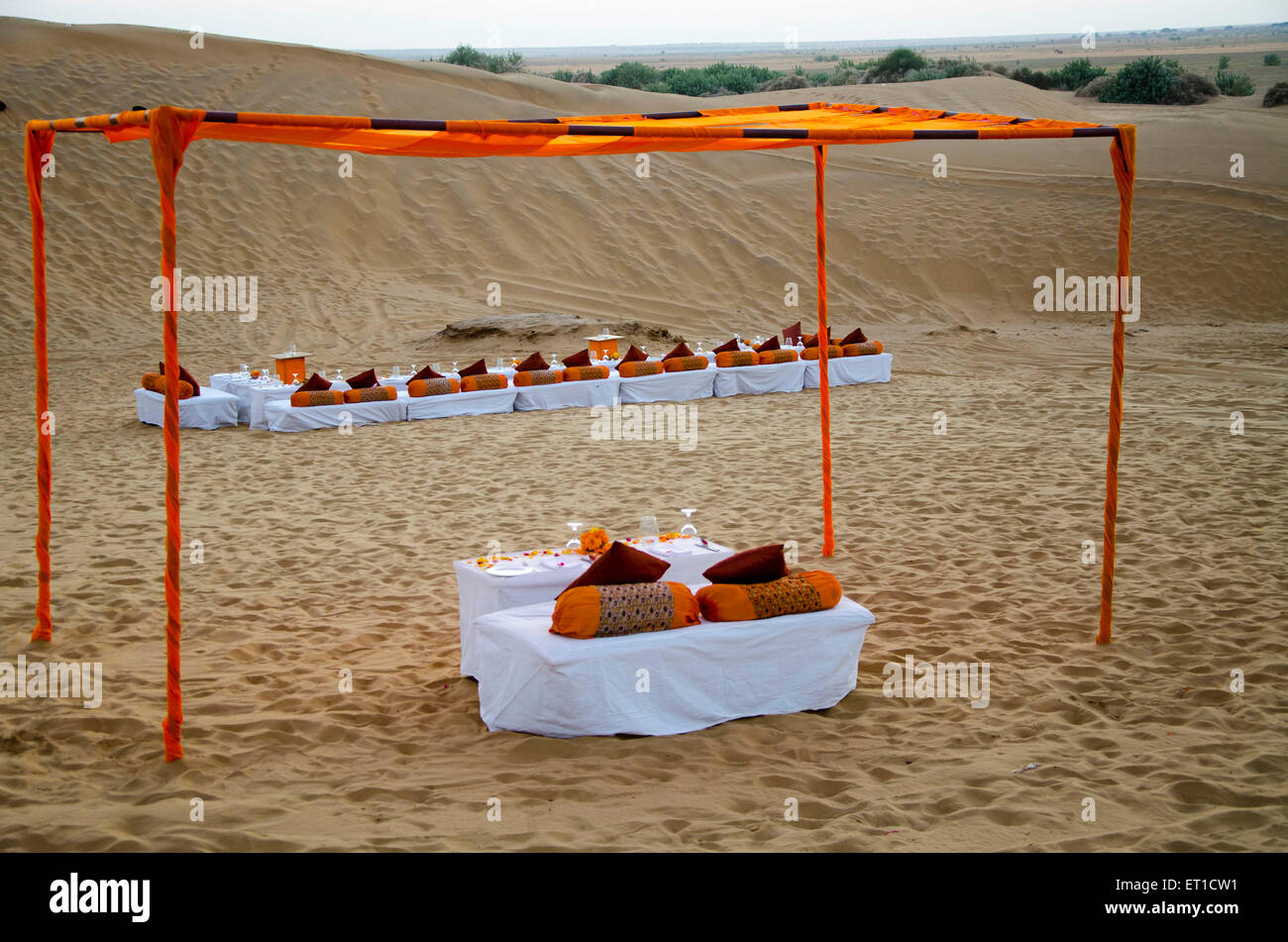 Traditional Sitting Arrangement of GaavTakiya for Tourists Party on Sand Dune Jaisalmer Rajasthan India Asia Stock Photo