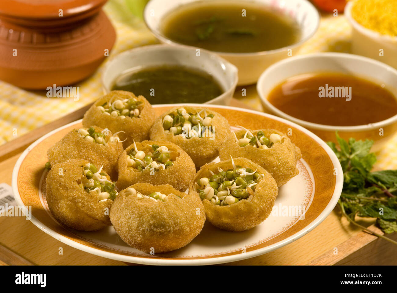 Pani puri with sprouted mung served in plate with chutney Stock Photo
