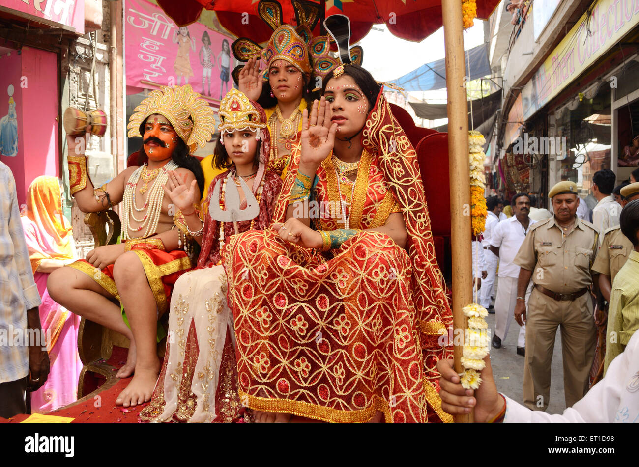 Girls in disguise of jain mythological characters in procession of