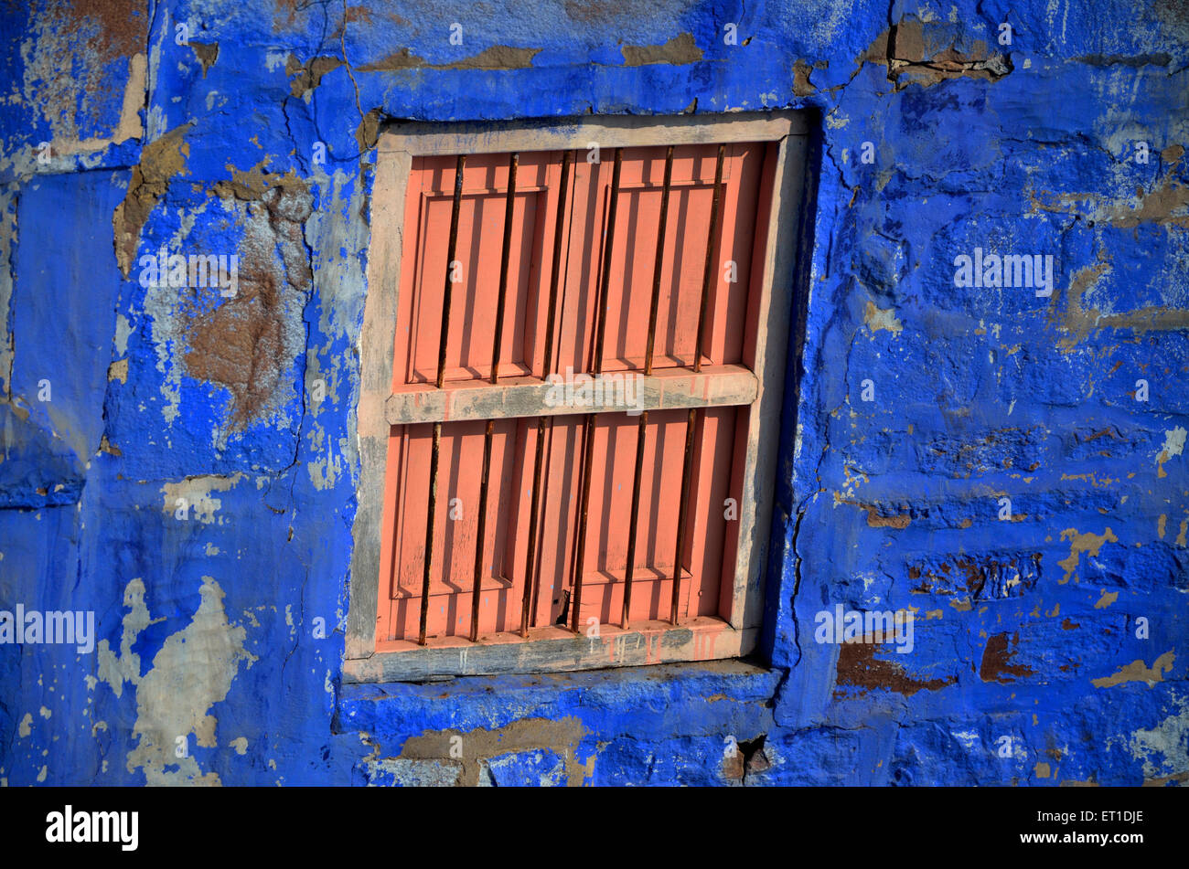 closed  window of blue house Jodhpur Rajasthan India Asia Stock Photo