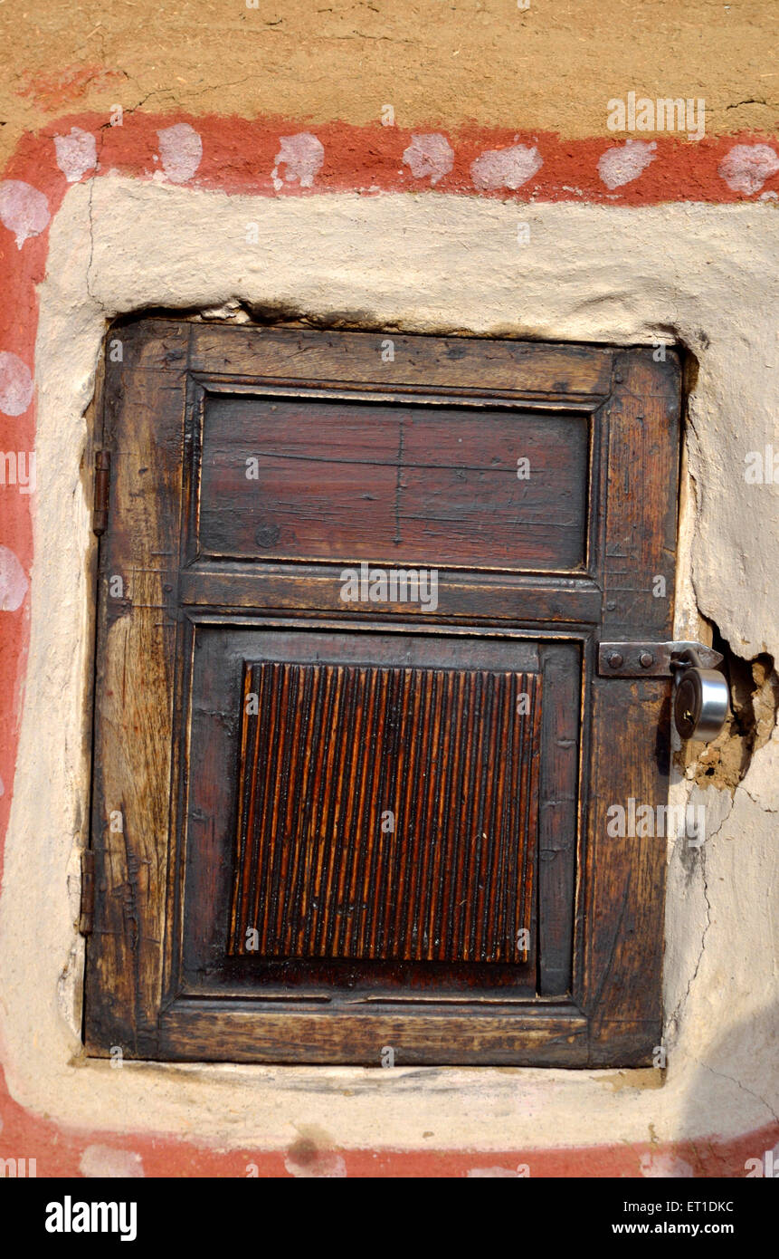 Small cupboard in alcove with wooden door Bikaner Rajasthan India Asia Stock Photo
