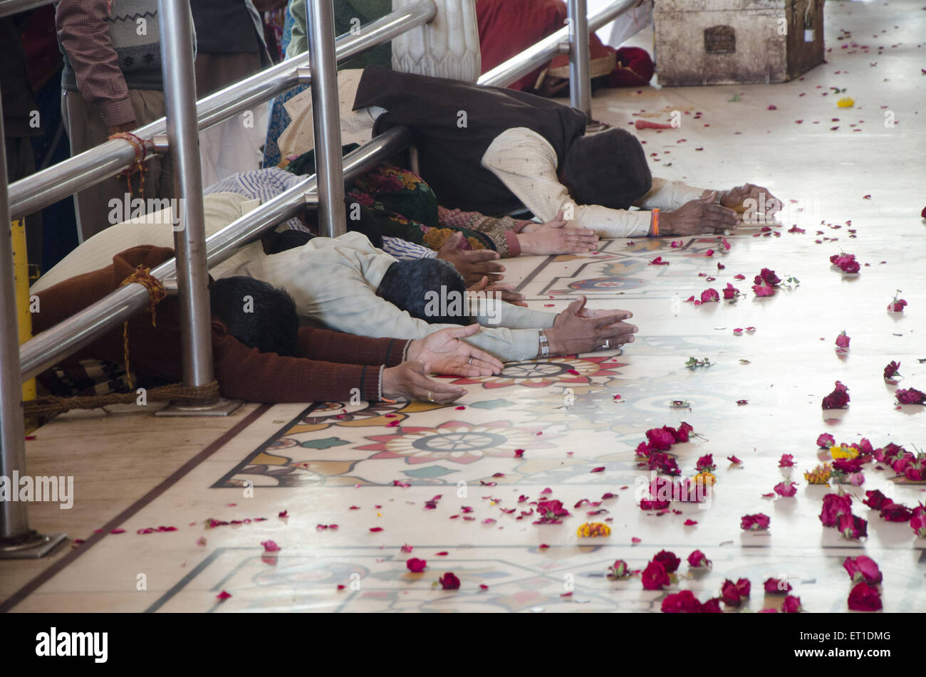 devotees bowing to God in Govind Devji Temple Jaipur at Rajasthan India Stock Photo