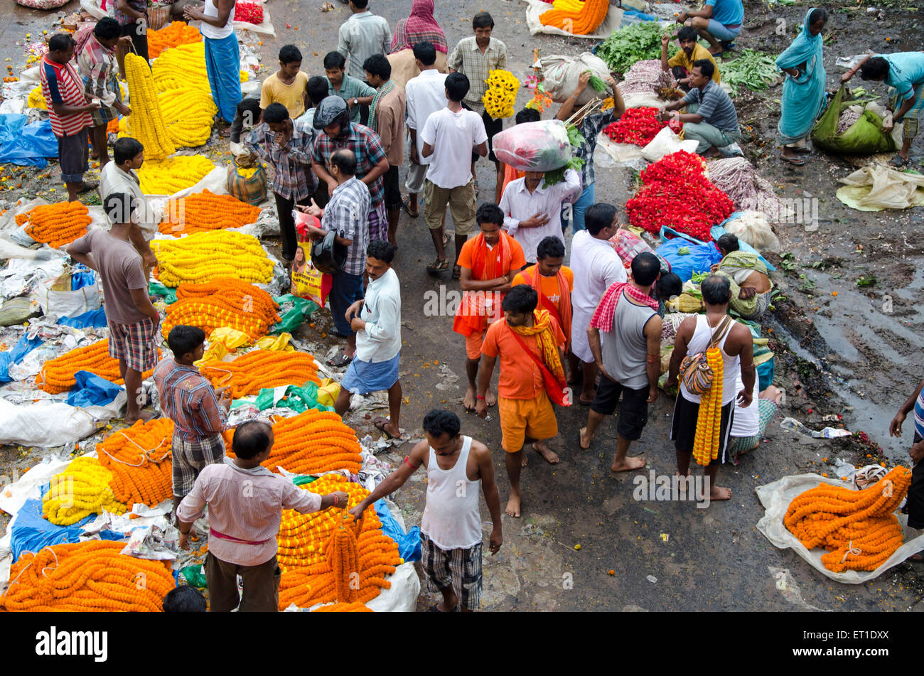 People buying flowers in market Kolkata at West Bengal India Asia Stock Photo