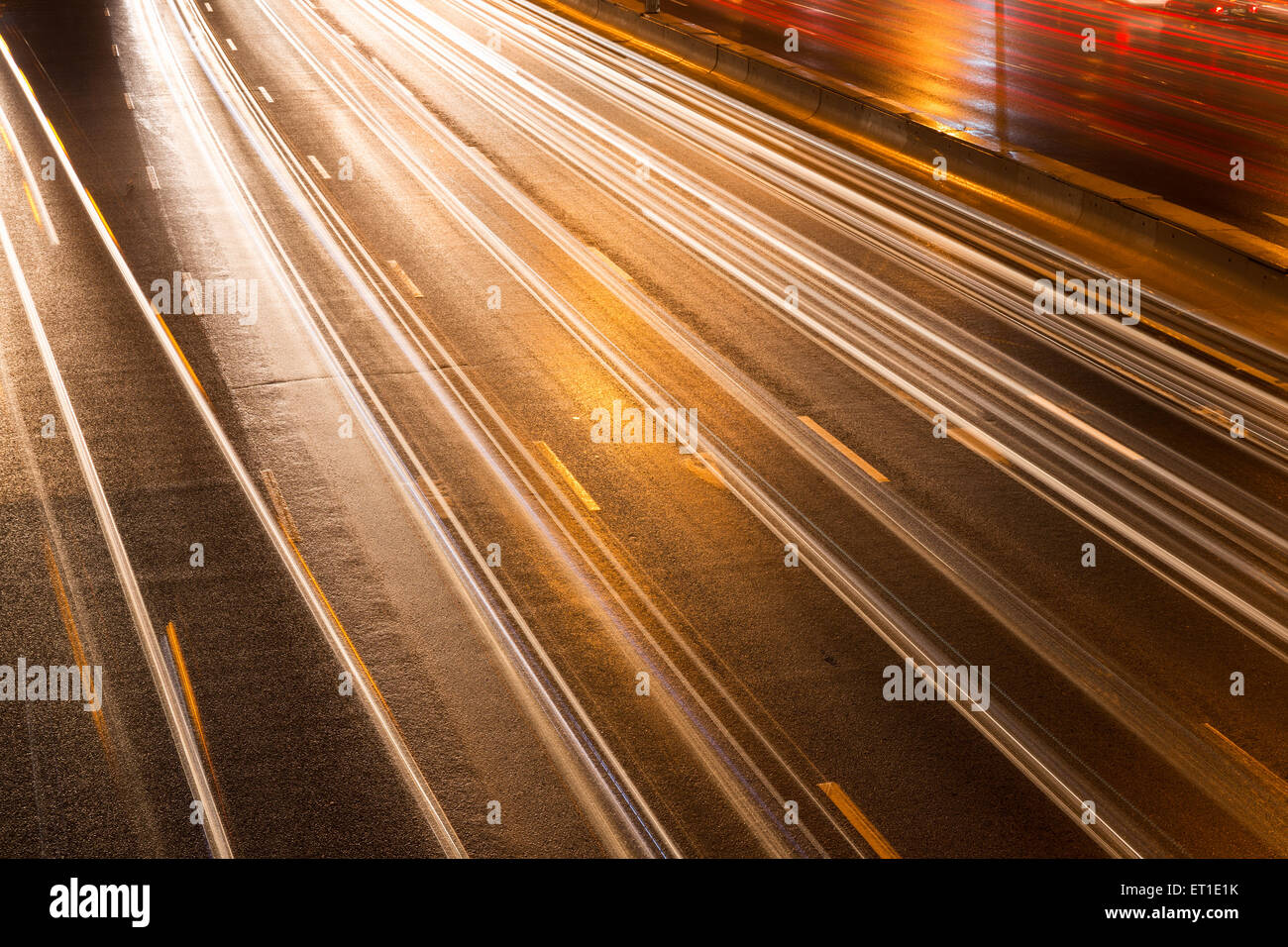 Closeup of the highway at night with light trails Stock Photo - Alamy