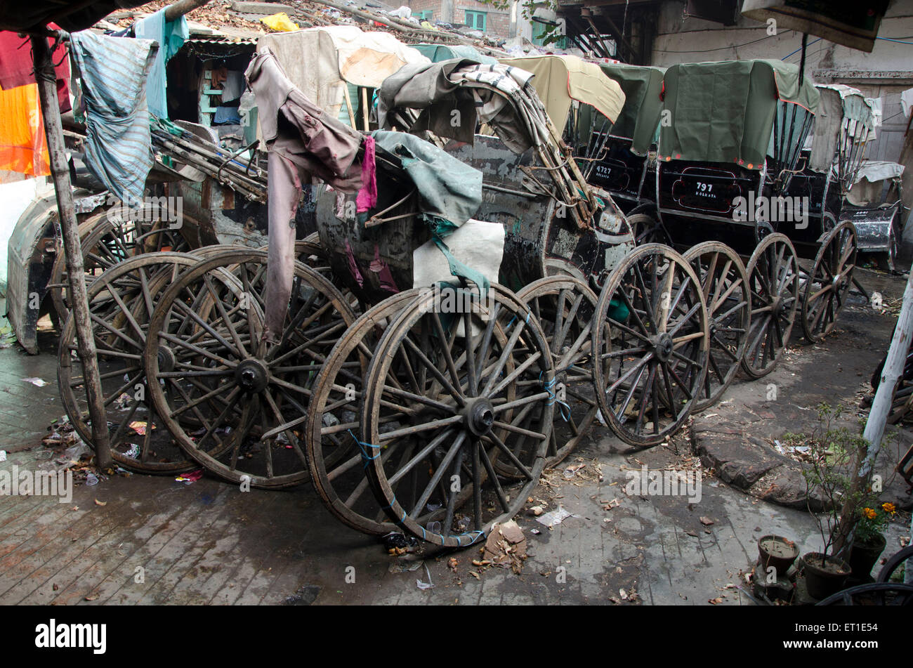 hand rickshaws lying for repairing Kolkata West Bengal India Asia Stock Photo