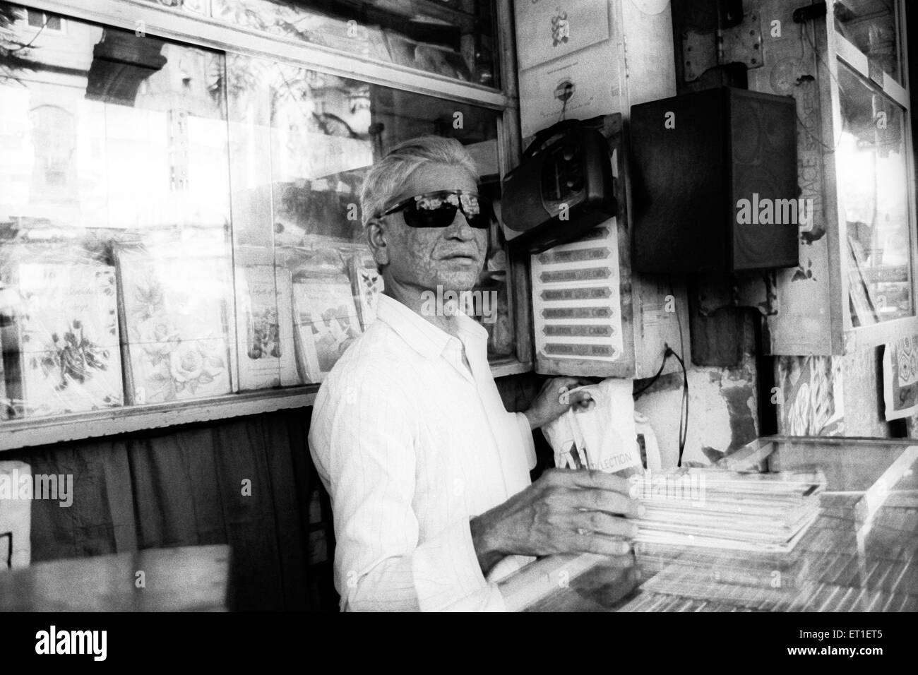 Shopkeeper Black and White Stock Photos & Images - Alamy