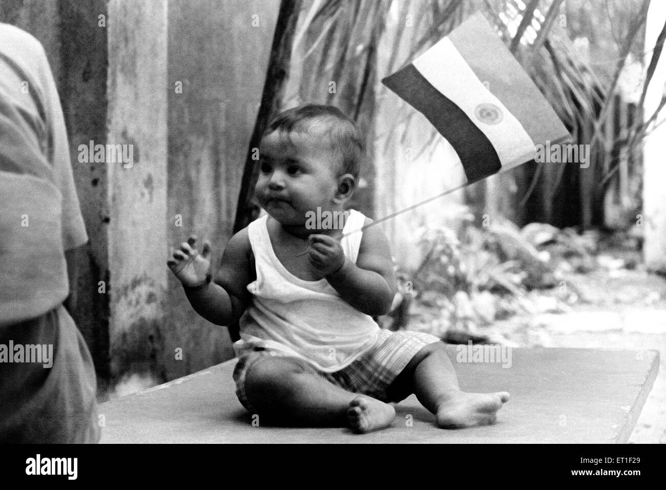 Baby girl Aparna with national flag ; India MR#400 Stock Photo