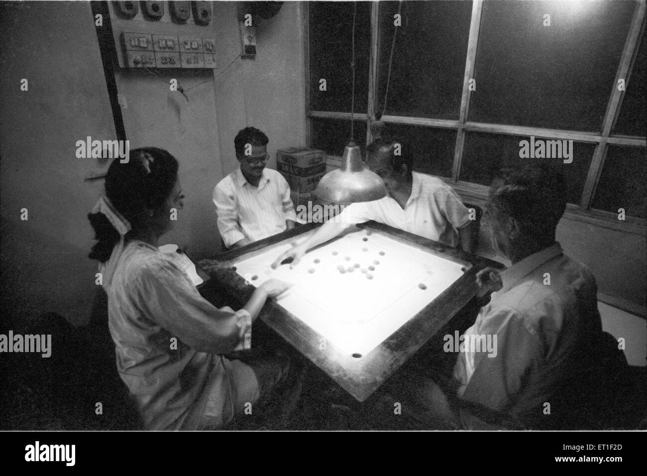 People playing carom ; India NO MR Stock Photo