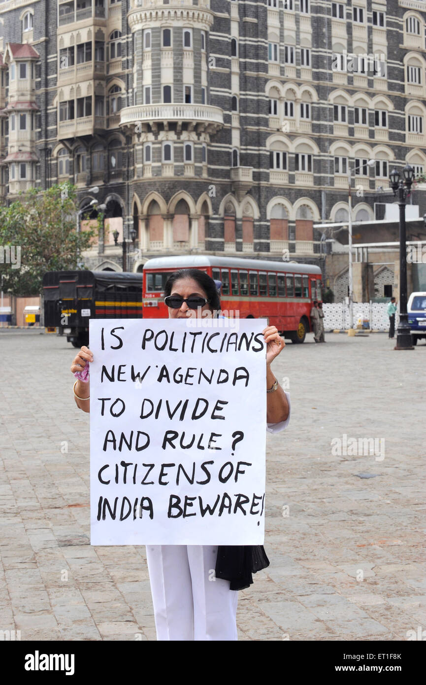 Protestor banner Taj Mahal hotel ; after terrorist attack by Deccan Mujahedeen on 26th November 2008 in Bombay Stock Photo