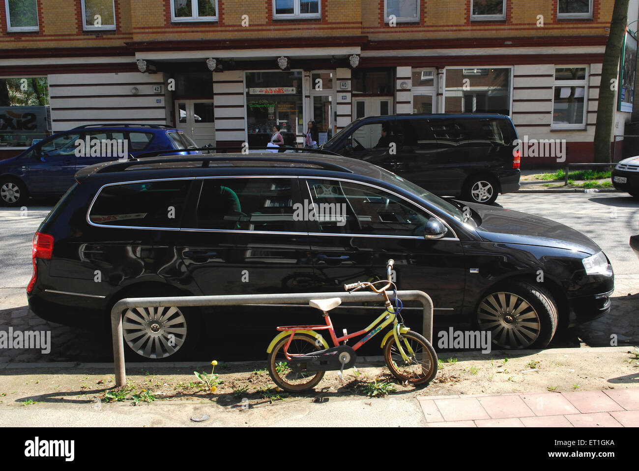 Car and cycle parked, Berlin, Germany, German, Europe, European Stock Photo