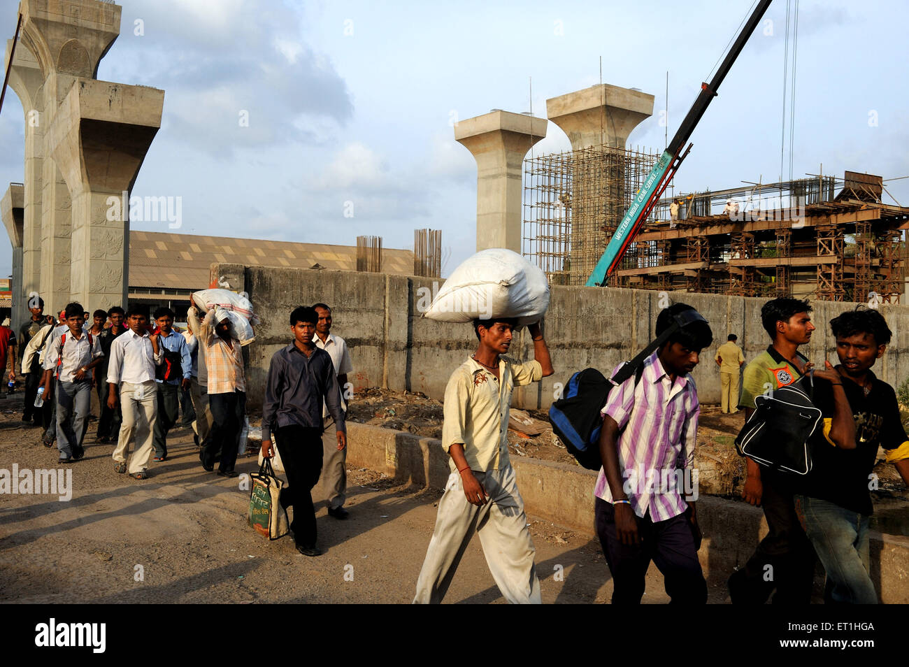 Pedestrians at bridge construction site, Bombay, Mumbai, Maharashtra, India, Asia, Asian, Indian Stock Photo