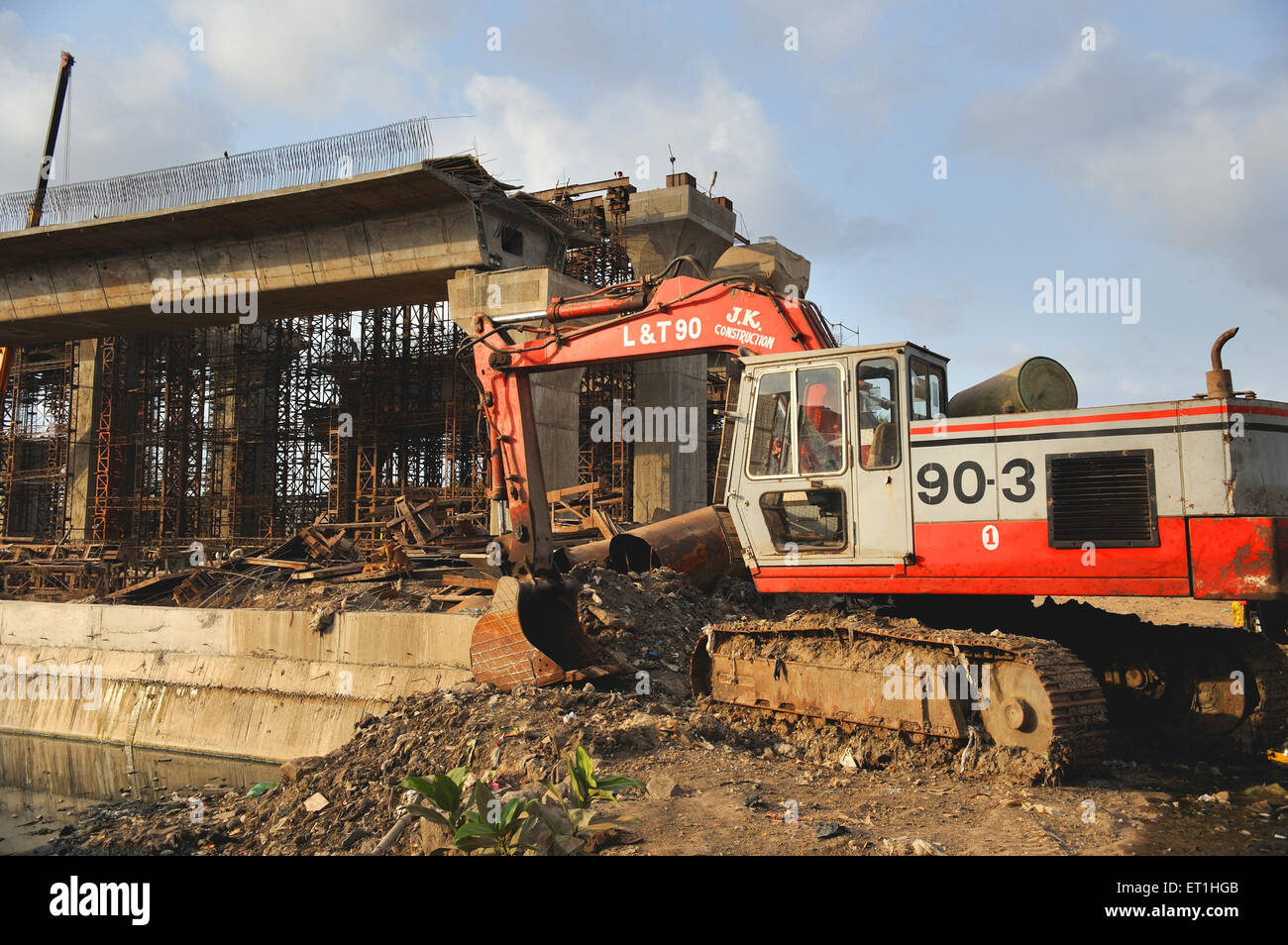 Excavator at bridge construction site, Bombay, Mumbai, Maharashtra, India, Asia, Asian, Indian Stock Photo
