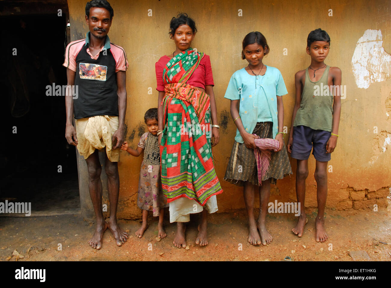 Ho tribes tribal family ; husband wife son daughter ; Chakradharpur ; Jharkhand ; India ; Asia Stock Photo