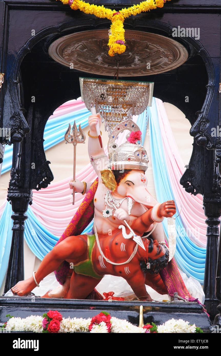 Lord Ganesh killing demon ; Pune ; Maharashtra ; India Stock Photo