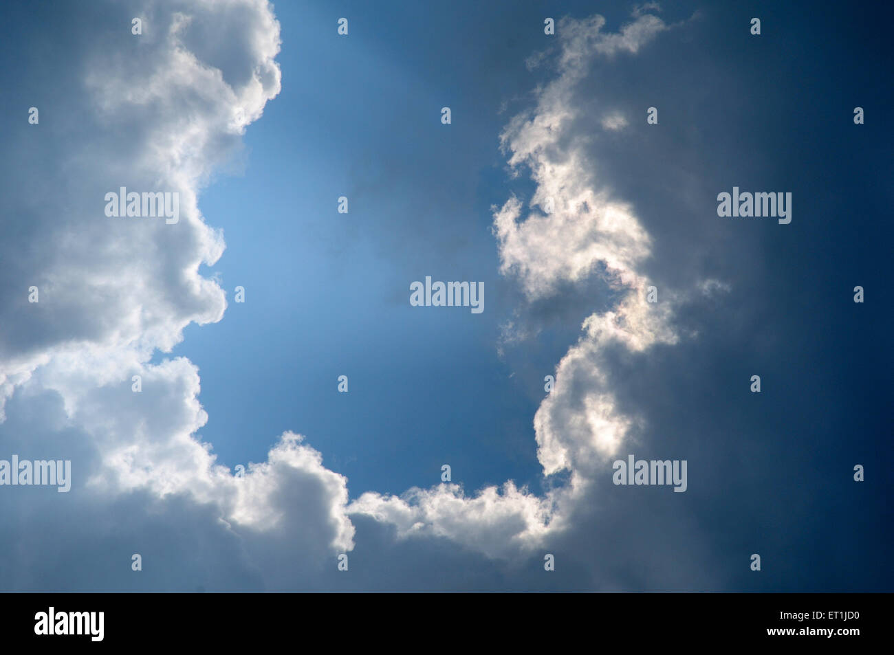 blue sky with white cloud clouds silver lining Stock Photo