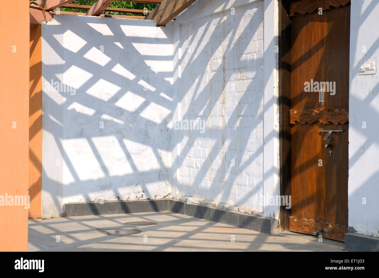 pergola shadow on wall ; Madhai Piparia ; Madhya Pradesh ; India Stock Photo
