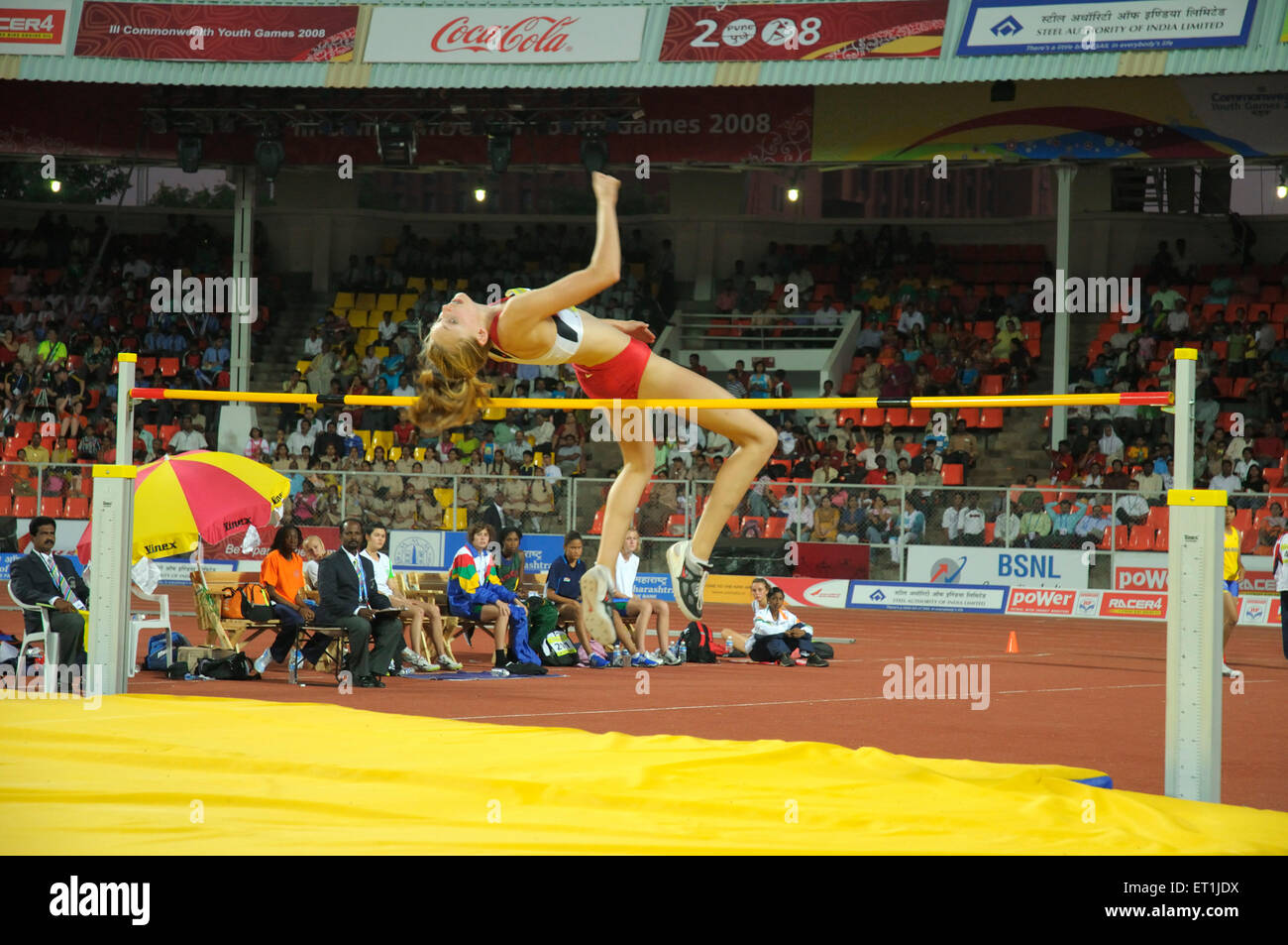 athlete high jump, sportswoman high jump, track and field, sports competition, athletic game, Pune, Maharashtra, India, Asia, Asian, Indian Stock Photo