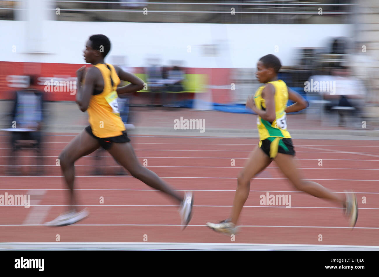 athletes running, sportsmen running, track and field, sports competition, athletic game, Pune, Maharashtra, India, Asia, Asian, Indian Stock Photo